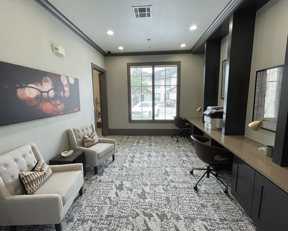 a view of a living room with a sink and a window