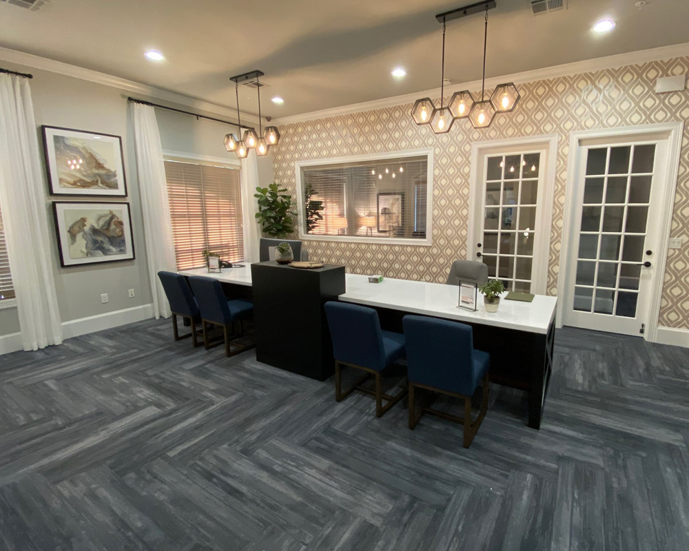 a living room filled with furniture and a fireplace